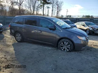 2014 Honda Odyssey EX-L with VIN 5FNRL5H66EB059115, listed as a Copart auction lot 81055334 with 173,410 mi miles and Salvage Title. Bid and sale history available at DreamBid. Image 4.