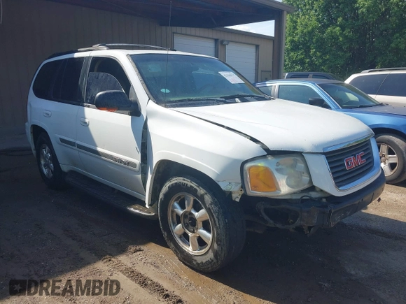 2003 GMC Envoy SLT with VIN 1GKDT13S432190085, listed as a IAAI auction lot 42106915 with 289,933 mi miles. Bid and sale history available at carsss.com. Image 1.