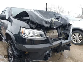 2018 Chevrolet Colorado 4WD ZR2 with VIN 1GCGTEEN9J1173647, listed as a IAAI auction lot 42016015 with 102,041 mi miles. Bid and sale history available at carsss.com. Image 6.