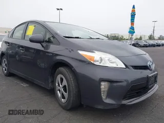 2015 Toyota Prius Four z VIN JTDKN3DU6F1977249, wystawiony jako IAAI lot #42490112 z przebiegiem 173 479 mil mil oraz . Historia ofert i sprzedaży dostępna na DreamBid. Obrazek 1.