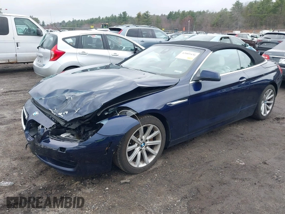 2013 BMW 6 Series 640i with VIN WBALW7C51DDX58713, listed as a IAAI auction lot 42005436 with 77,563 mi miles and . Bid and sale history available at carsss.com. Image 18.