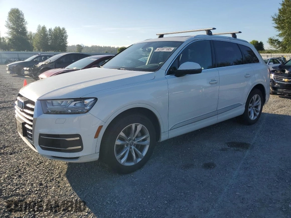 2018 Audi Q7 Premium Plus with VIN WA1LAAF70JD015073, listed as a Copart auction lot 63187185 with 86,353 mi miles and Salvage title. Bid and sale history available at DreamBid. Image 1.