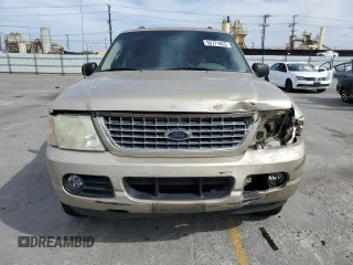 2004 Ford Explorer XLT with VIN 1FMZU63K44ZA03864, listed as a Copart auction lot 56771855 with 212,900 mi miles and Salvage title. Bid and sale history available at DreamBid. Image 5.