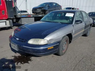 2000 Chevrolet Lumina with VIN 2G1WL52J7Y1355941, listed as a IAAI auction lot 42007306 with 309,954 mi miles. Bid and sale history available at carsss.com. Image 2.