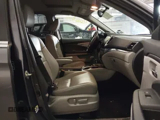 2016 Honda Pilot EX-L with VIN 5FNYF6H75GB104064, listed as a IAAI auction lot 41286959 with 106,263 mi miles. Bid and sale history available at carsss.com. Image 5.