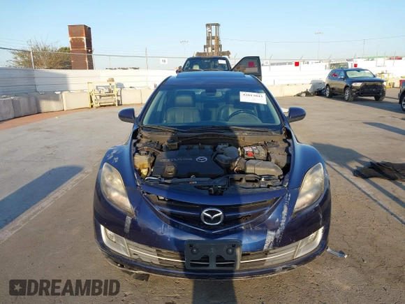 2009 Mazda 6 S Grand Touring with VIN 1YVHP82BX95M21357, listed as a IAAI auction lot 42013043 with 119,701 mi miles and . Bid and sale history available at DreamBid. Image 13.