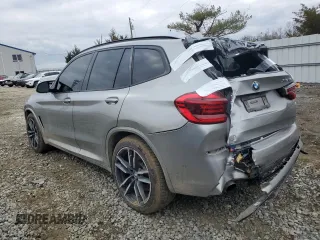 2020 BMW X3 M with VIN 5YMTS0C00L9B39865, listed as a Copart auction lot 87419774 with 36,430 mi miles and Salvage Title. Bid and sale history available at carsss.com. Image 2.