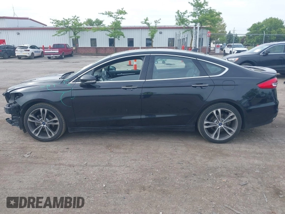 2020 Ford Fusion Titanium with VIN 3FA6P0K94LR117138, listed as a IAAI auction lot 42345819 with 88,117 mi miles and . Bid and sale history available at DreamBid. Image 15.