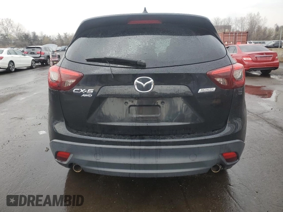 2016 Mazda CX-5 Grand Touring with VIN JM3KE4DYXG0711367, listed as a Copart auction lot 52862405 with 87,870 mi miles and Salvage Title. Bid and sale history available at DreamBid. Image 6.