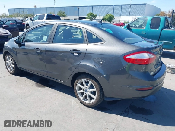 2019 Ford Fiesta SE z VIN 3FADP4BJ2KM131012, wystawiony jako IAAI lot #42228822 z przebiegiem 100 460 mil mil oraz . Historia ofert i sprzedaży dostępna na DreamBid. Obrazek 3.