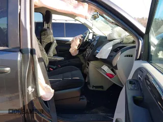 2016 Dodge Grand Caravan SE with VIN 2C4RDGBG4GR382970, listed as a IAAI auction lot 41215666 with 93,534 mi miles and . Bid and sale history available at DreamBid. Image 5.