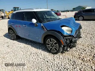 2011 MINI Countryman S with VIN WMWZC5C54BWL53955, listed as a Copart auction lot 52187405 with 124,470 mi miles and Salvage Title. Bid and sale history available at DreamBid. Image 11.