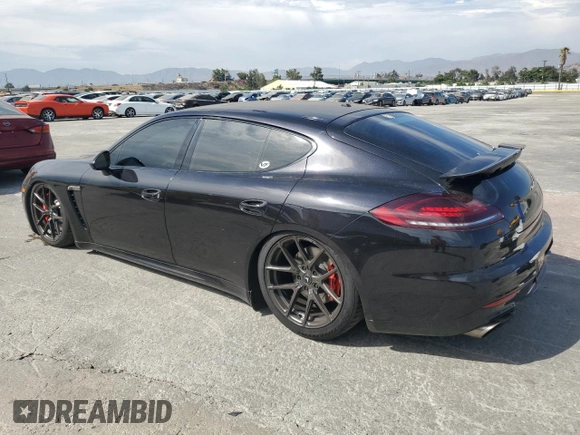 2014 Porsche Panamera Turbo z VIN WP0AC2A72EL073234, wystawiony jako Copart lot #65813464 z przebiegiem 83 918 mil mil oraz Szkoda całkowita • Salvage title. Historia ofert i sprzedaży dostępna na DreamBid. Obrazek 2.