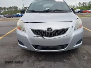 2009 Toyota Yaris with VIN JTDBT903394043218, listed as a IAAI auction lot 41974570 with 281,000 mi miles. Bid and sale history available at carsss.com. Image 6.