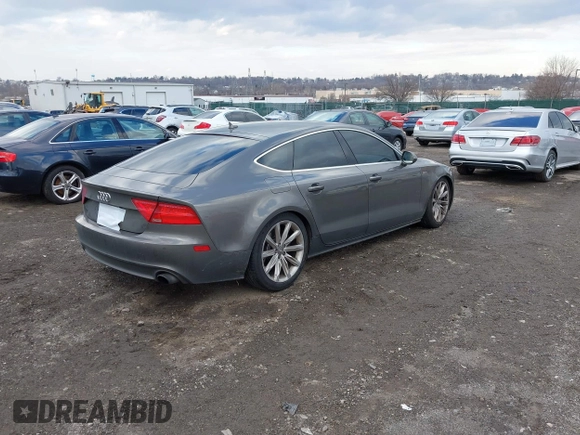 2013 Audi A7 3.0 Premium Plus with VIN WAUYGAFC5DN077054, listed as a IAAI auction lot 41298537 with 150,679 mi miles. Bid and sale history available at carsss.com. Image 4.