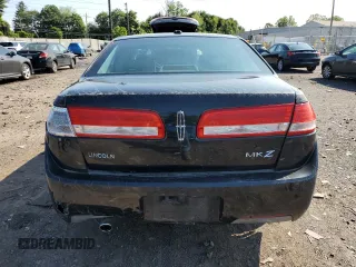 2010 Lincoln MKZ z VIN 3LNHL2GCXAR751058, wystawiony jako Copart lot #58390005 z przebiegiem 61 452 mil mil oraz Szkoda całkowita • Salvage title. Historia ofert i sprzedaży dostępna na DreamBid. Obrazek 6.