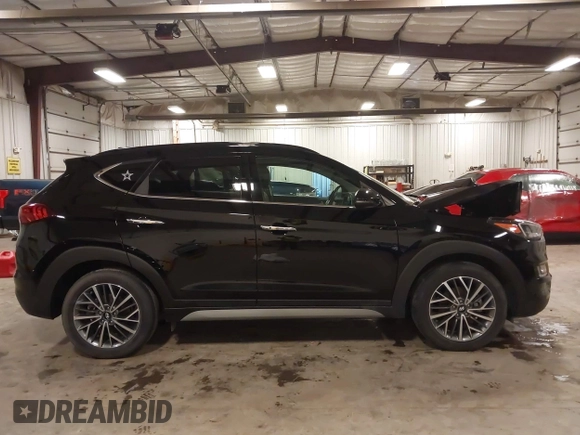 2021 Hyundai Tucson Limited with VIN KM8J3CAL6MU385001, listed as a IAAI auction lot 42230850 with 30,439 mi miles and . Bid and sale history available at DreamBid. Image 14.