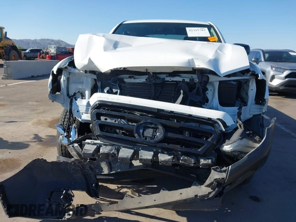 2021 Toyota Tacoma SR with VIN 3TYRX5GN8MT013815, listed as a IAAI auction lot 42311783 with 28,327 mi miles and . Bid and sale history available at DreamBid. Image 6.