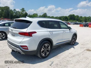 2019 Hyundai Santa Fe Limited z VIN 5NMS5CAA1KH136238, wystawiony jako IAAI lot #42314285 z przebiegiem 74 606 mil mil oraz . Historia ofert i sprzedaży dostępna na DreamBid. Obrazek 4.