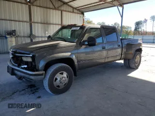 2000 Chevrolet Silverado 3500 z VIN 1GCHK33J3YF421917, wystawiony jako Copart lot #80744994 z przebiegiem 122 697 mil mil oraz Szkody całkowita. Historia ofert i sprzedaży dostępna na DreamBid. Obrazek 1.