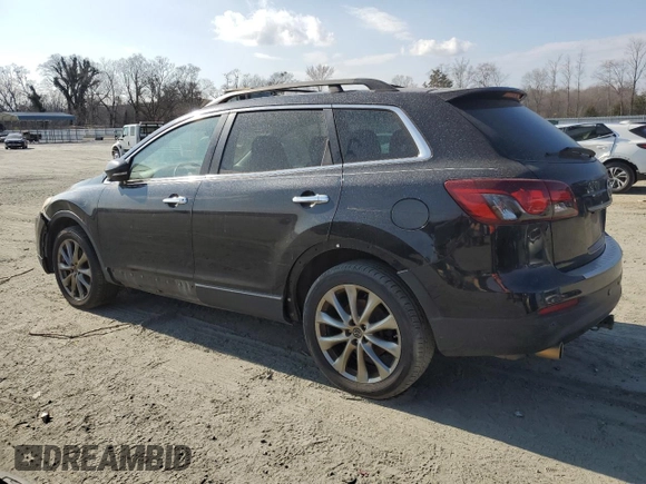2015 Mazda CX-9 Grand Touring with VIN JM3TB2DA1F0457499, listed as a Copart auction lot 44647895 with 216,229 mi miles and Clean Title. Bid and sale history available at DreamBid. Image 2.