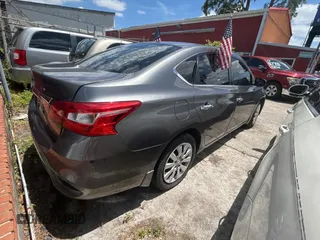 2017 Nissan Sentra S with VIN 3N1AB7AP0HY230614, listed as a Copart auction lot 55637165 with 160,030 mi miles and Clean Title. Bid and sale history available at carsss.com. Image 4.