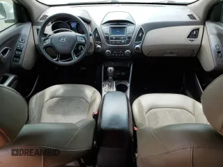 2015 Hyundai Tucson GLS with VIN KM8JT3AF4FU105959, listed as a Copart auction lot 62782944 with 156,733 mi miles and Salvage Title. Bid and sale history available at DreamBid. Image 8.