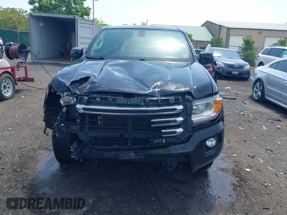 2016 GMC Canyon 4WD SLE z VIN 1GTG6CE35G1171168, wystawiony jako IAAI lot #42275447 z przebiegiem 171 581 mil mil oraz . Historia ofert i sprzedaży dostępna na DreamBid. Obrazek 12.