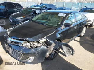2015 Toyota Avalon Limited with VIN 4T1BK1EB2FU167458, listed as a IAAI auction lot 41987423 with Not Provided miles and . Bid and sale history available at DreamBid. Image 2.