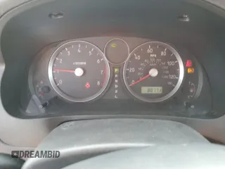 2006 Suzuki Aerio Premium z VIN JS2RC62H065351383, wystawiony jako Copart lot #82933084 z przebiegiem 80 771 mil mil oraz Tytuł czysty. Historia ofert i sprzedaży dostępna na DreamBid. Obrazek 9.