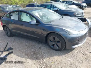 2021 Tesla Model 3 Long Range z VIN 5YJ3E1EB0MF903058, wystawiony jako IAAI lot #42013508 z przebiegiem 50 618 mil mil oraz . Historia ofert i sprzedaży dostępna na DreamBid. Obrazek 1.