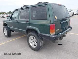 1999 Jeep Cherokee Sport z VIN 1J4FT68S1XL667138, wystawiony jako IAAI lot #42651020 z przebiegiem 200 324 mil mil oraz . Historia ofert i sprzedaży dostępna na DreamBid. Obrazek 3.
