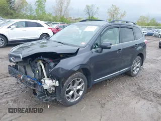 2016 Subaru Forester Touring z VIN JF2SJAXC4GH536118, wystawiony jako IAAI lot #42208701 z przebiegiem 117 227 mil mil oraz . Historia ofert i sprzedaży dostępna na DreamBid. Obrazek 17.