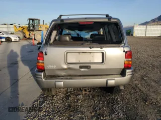 1998 Jeep Grand Cherokee Limited с VIN 1J4GZ78Y0WC260231, выставлен на аукционе Copart как лот 85149724 с пробегом 203 258 миль миль и Списание • Salvage title. История ставок и продаж доступна на DreamBid. Изображение 6.
