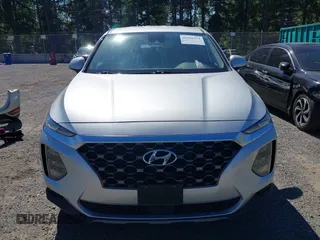 2019 Hyundai Santa Fe SE with VIN 5NMS2CAD9KH122140, listed as a IAAI auction lot 42616171 with 50,794 mi miles and . Bid and sale history available at DreamBid. Image 13.