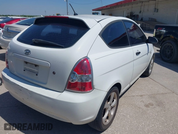 2007 Hyundai Accent SE with VIN KMHCN36C47U009459, listed as a IAAI auction lot 41979395 with 202,844 mi miles. Bid and sale history available at carsss.com. Image 4.