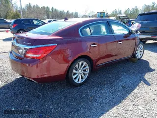 2014 Buick LaCrosse Leather with VIN 1G4GB5G37EF255881, listed as a IAAI auction lot 41674071 with 102,426 mi miles. Bid and sale history available at carsss.com. Image 4.