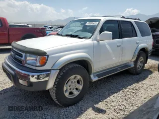 2000 Toyota 4Runner SR5 with VIN JT3HN86R9Y0306462, listed as a Copart auction lot 65065475 with 215,766 mi miles and Salvage title. Bid and sale history available at DreamBid. Image 1.