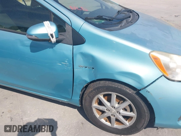 2013 Toyota Prius One z VIN JTDKDTB38D1039697, wystawiony jako IAAI lot #42378154 z przebiegiem 177 044 mil mil oraz . Historia ofert i sprzedaży dostępna na DreamBid. Obrazek 6.