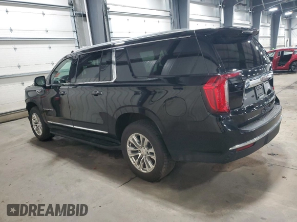 2021 GMC Yukon XL SLT with VIN 1GKS2GKDXMR371393, listed as a Copart auction lot 85052824 with 104,432 mi miles and Salvage Title. Bid and sale history available at carsss.com. Image 2.
