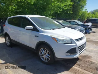 2016 Ford Escape SE z VIN 1FMCU9GX1GUC67851, wystawiony jako IAAI lot #42283011 z przebiegiem 134 458 mil mil oraz . Historia ofert i sprzedaży dostępna na DreamBid. Obrazek 1.