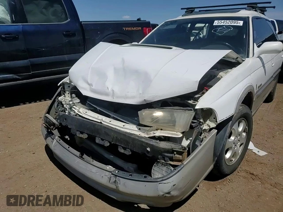 1999 Subaru Legacy Outback with VIN 4S3BG6855X7645042, listed as a Copart auction lot 55452095 with 159,874 mi miles and Salvage title. Bid and sale history available at DreamBid. Image 13.