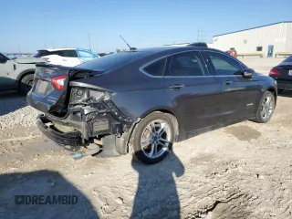 2016 Ford Fusion Titanium Hybrid with VIN 3FA6P0RU9GR289892, listed as a Copart auction lot 42735125 with 82,386 mi miles and Salvage Title. Bid and sale history available at carsss.com. Image 3.