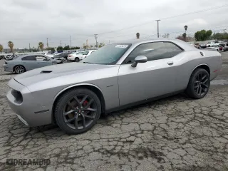 2018 Dodge Challenger R/T with VIN 2C3CDZBT9JH265434, listed as a Copart auction lot 51235425 with 106,779 mi miles and Salvage Title. Bid and sale history available at carsss.com. Image 1.
