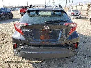 2021 Toyota C-HR LE z VIN JTNKHMBX0M1096503, wystawiony jako Copart lot #55501725 z przebiegiem 29 774 mil mil oraz Szkoda całkowita • Salvage title. Historia ofert i sprzedaży dostępna na DreamBid. Obrazek 6.