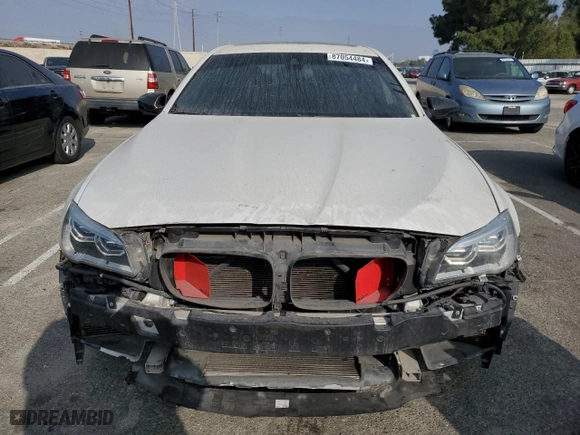 2014 BMW M5 with VIN WBSFV9C56ED097642, listed as a Copart auction lot 87054484 with 77,022 mi miles and Salvage Title. Bid and sale history available at carsss.com. Image 5.