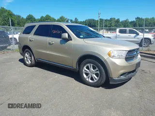 2012 Dodge Durango SXT z VIN 1C4RDJAG4CC147535, wystawiony jako IAAI lot #42805283 z przebiegiem 147 268 mil mil oraz . Historia ofert i sprzedaży dostępna na DreamBid. Obrazek 1.