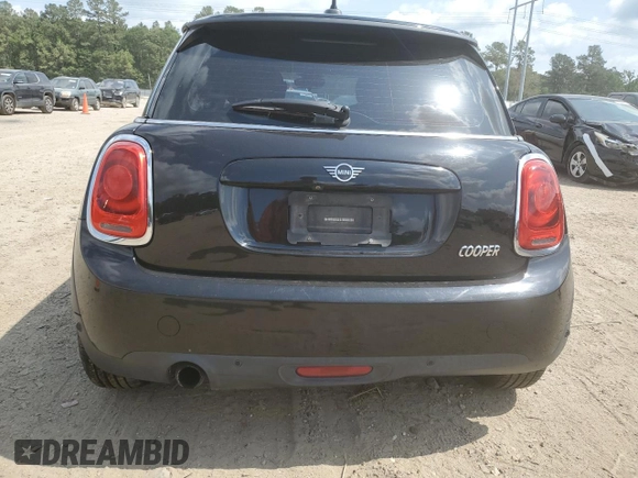 2019 MINI Hardtop Cooper with VIN WMWXP5C57K2H30753, listed as a Copart auction lot 57347275 with 98,063 mi miles and Salvage title. Bid and sale history available at DreamBid. Image 6.