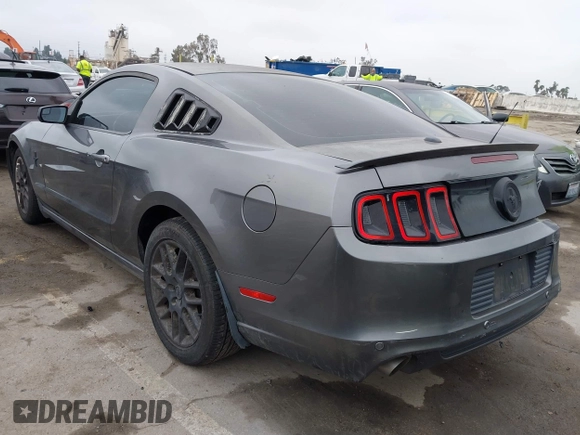 2013 Ford Mustang V6 with VIN 1ZVBP8AM6D5241569, listed as a IAAI auction lot 41884583 with 100,700 mi miles. Bid and sale history available at carsss.com. Image 3.