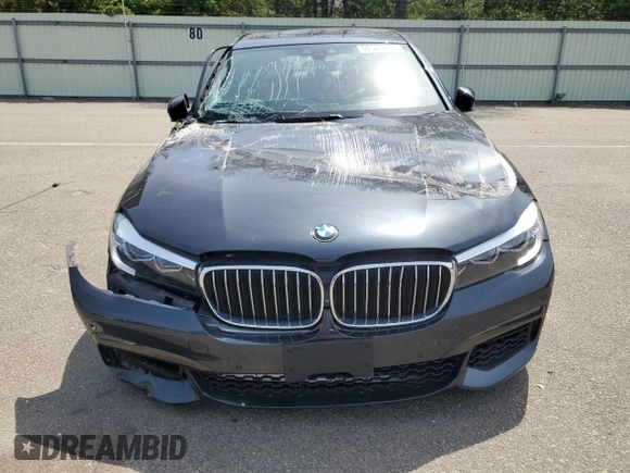 2019 BMW 7 Series 740i xDrive z VIN WBA7E4C56KGV71028, wystawiony jako Copart lot #76860474 z przebiegiem 66 657 mil mil oraz Nie do naprawy • Non repairable. Historia ofert i sprzedaży dostępna na DreamBid. Obrazek 5.
